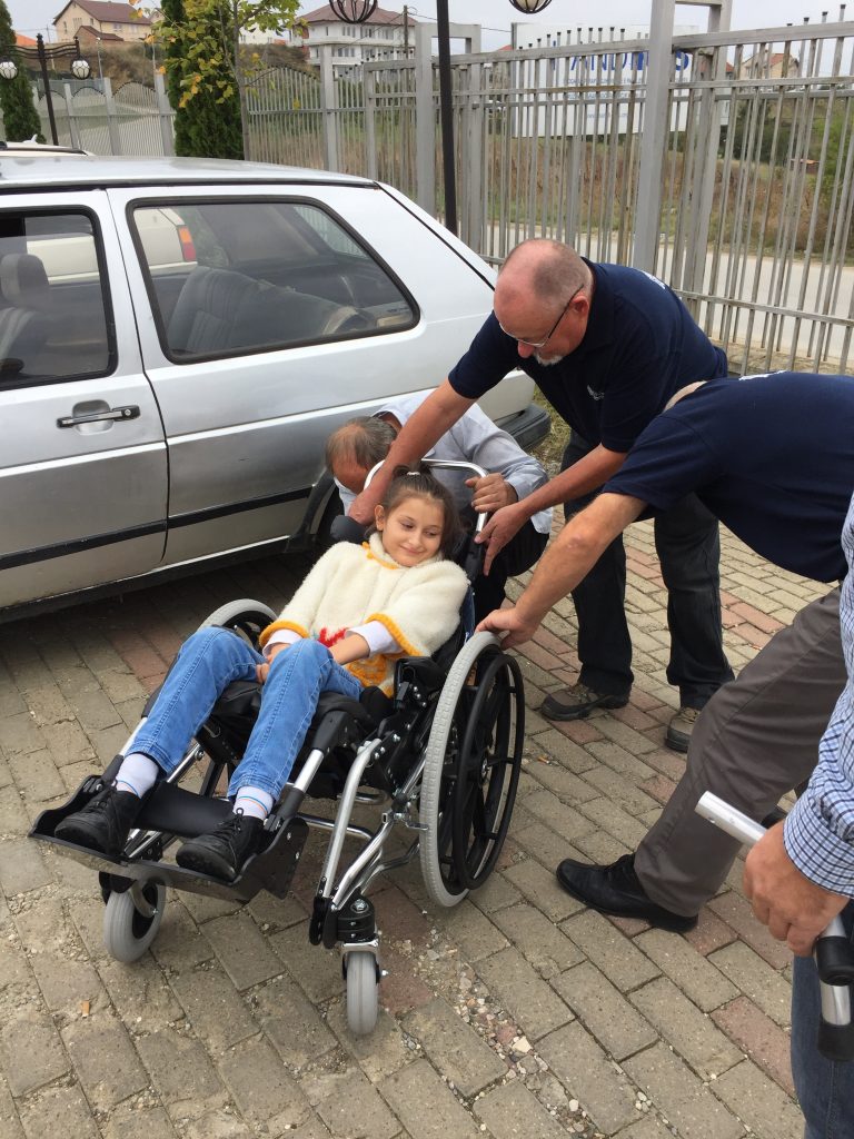 Wayne Hanson gives young girl her first test run.