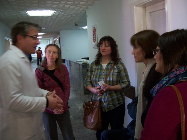 A doctor tells the Team some of the needs of the hospital and what additional training is needed. 