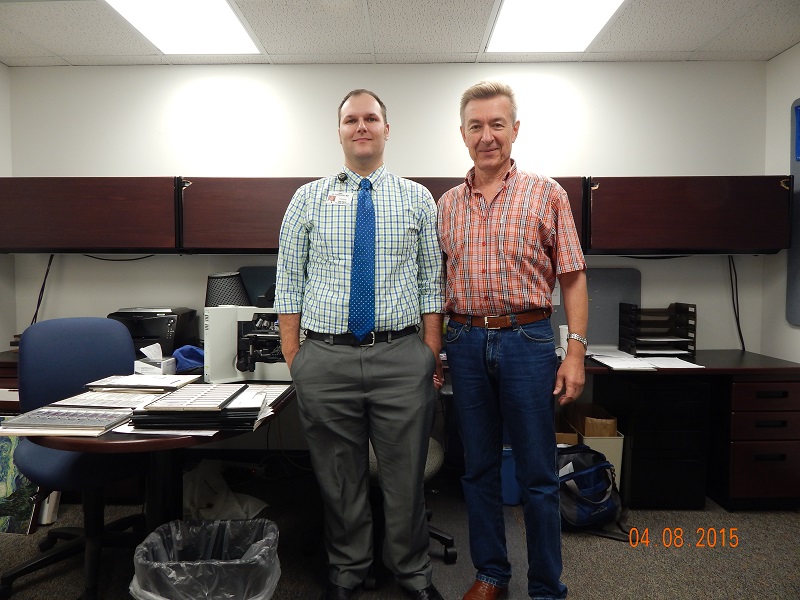 Dr. Johnson of Bronson Hospital host's Dr. Rogov in the Pathology Dept.