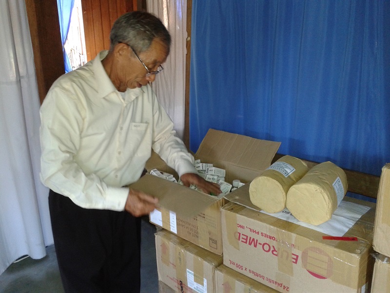 Graham opens new shipment of medicines
